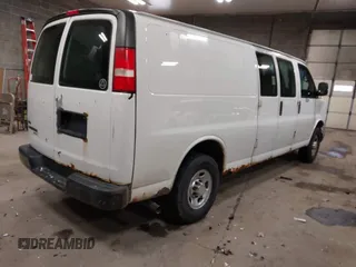 2012 Chevrolet Express Cargo Van with VIN 1GCWGGBA0C1100411, listed as a IAAI auction lot 41024219 with 197,251 mi miles. Bid and sale history available at carsss.com. Image 4.