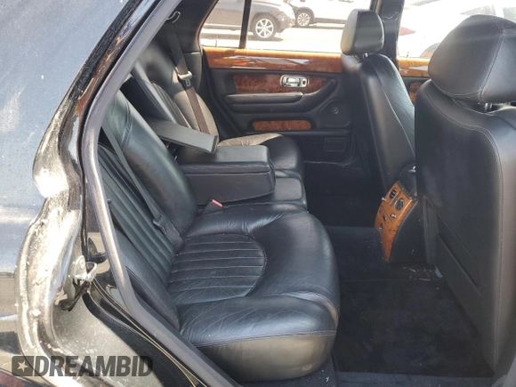2001 Bentley Arnage с VIN SCBLC31E81CX05759, выставлен на аукционе Copart как лот 56231445 с пробегом Не указан миль и Чистый • Clean title. История ставок и продаж доступна на DreamBid. Изображение 10.
