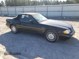 1997 Mercedes-Benz SL-Class with VIN WDBFA67F9VF146887, listed as a Copart auction lot 77166464 with 0 mi miles and Salvage Title. Bid and sale history available at carsss.com. Image 4.