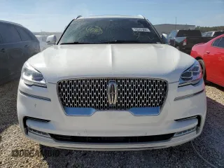 2021 Lincoln Aviator Reserve z VIN 5LM5J7WCXMGL18310, wystawiony jako Copart lot #76247904 z przebiegiem 69 111 mil mil oraz Nie do naprawy • Non repairable. Historia ofert i sprzedaży dostępna na DreamBid. Obrazek 5.