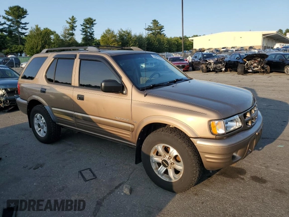2001 Isuzu Rodeo S with VIN 4S2CK58W314334096, listed as a Copart auction lot 68262924 with 140,657 mi miles and Salvage Title. Bid and sale history available at DreamBid. Image 4.