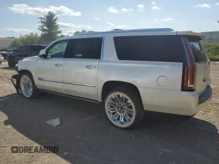 2015 Cadillac Escalade ESV Platinum z VIN 1GYS4UKJ6FR698719, wystawiony jako Copart lot #62085824 z przebiegiem 149 882 mil mil oraz Czysty tytuł • Clean title. Historia ofert i sprzedaży dostępna na DreamBid. Obrazek 2.