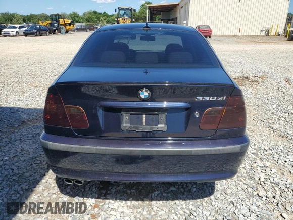 2005 BMW 3 Series 330xi with VIN WBAEW53495PN37185, listed as a Copart auction lot 56757665 with 123,515 mi miles and Salvage title. Bid and sale history available at DreamBid. Image 6.
