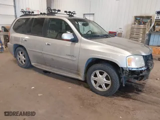 2005 GMC Envoy Denali with VIN 1GKET63M552322714, listed as a IAAI auction lot 41472751 with 197,287 mi miles. Bid and sale history available at carsss.com. Image 1.