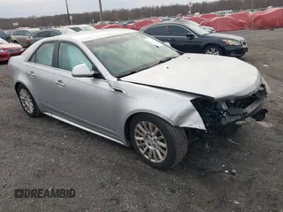 2012 Cadillac CTS z VIN 1G6DA5E50C0152626, wystawiony jako IAAI lot #41101077 z przebiegiem 104 324 mil mil oraz . Historia ofert i sprzedaży dostępna na DreamBid. Obrazek 1.