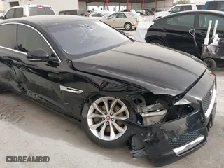 2019 Jaguar XF 25t Premium with VIN SAJBD4FX4KCY79210, listed as a IAAI auction lot 41716178 with 76,314 mi miles. Bid and sale history available at carsss.com. Image 18.