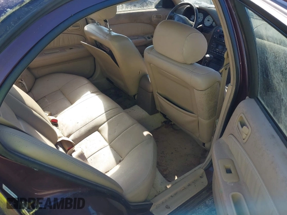 1998 Nissan Maxima GXE z VIN JN1CA21A0WT402950, wystawiony jako IAAI lot #41825084 z przebiegiem 244 042 mil mil oraz . Historia ofert i sprzedaży dostępna na DreamBid. Obrazek 8.
