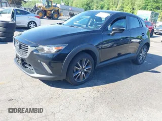 2018 Mazda CX-3 Touring z VIN JM1DKFC73J0321605, wystawiony jako IAAI lot #42355269 z przebiegiem 40 053 mil mil oraz . Historia ofert i sprzedaży dostępna na DreamBid. Obrazek 17.