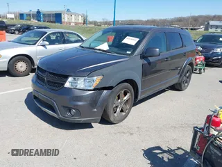 2016 Dodge Journey SXT with VIN 3C4PDCBG0GT137404, listed as a IAAI auction lot 41838503 with 134,963 mi miles. Bid and sale history available at carsss.com. Image 2.