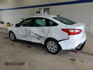 2012 Ford Focus SE with VIN 1FAHP3F20CL451852, listed as a Copart auction lot 60310765 with 150,305 mi miles and Salvage title. Bid and sale history available at DreamBid. Image 2.