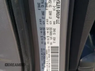 2014 Dodge Durango SXT z VIN 1C4RDJAG8EC455892, wystawiony jako Copart lot #57796095 z przebiegiem 98 251 mil mil oraz Szkoda całkowita • Salvage title. Historia ofert i sprzedaży dostępna na DreamBid. Obrazek 12.