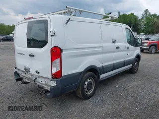 2016 Ford Transit Cargo with VIN 1FTYE1ZM8GKA63622, listed as a IAAI auction lot 41887397 with 153,206 mi miles and . Bid and sale history available at carsss.com. Image 4.