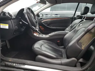 2009 Mercedes-Benz CLK 550 with VIN WDBTK72F29T102928, listed as a Copart auction lot 81982294 with 103,022 mi miles and Salvage Title. Bid and sale history available at DreamBid. Image 7.