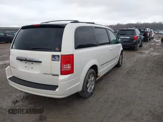 2010 Chrysler Town & Country Touring with VIN 2A4RR5D19AR441155, listed as a IAAI auction lot 41848553 with 197,088 mi miles. Bid and sale history available at carsss.com. Image 4.