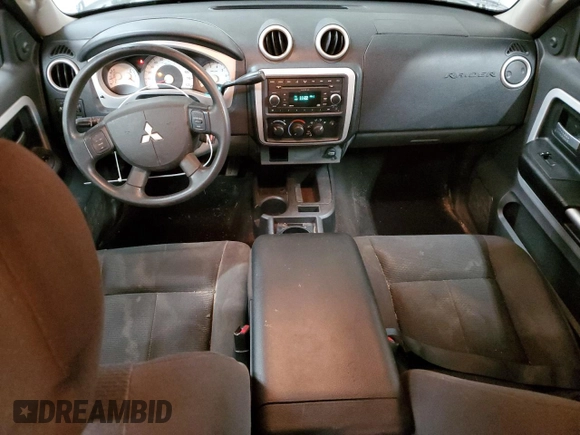 2008 Mitsubishi Raider LS z VIN 1Z7HC28KX8S572256, wystawiony jako Copart lot #76278594 z przebiegiem 139 373 mil mil oraz Szkoda całkowita • Salvage title. Historia ofert i sprzedaży dostępna na DreamBid. Obrazek 8.