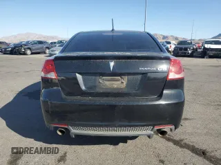 2009 Pontiac G8 z VIN 6G2ER57769L215137, wystawiony jako Copart lot #52262665 z przebiegiem 174 574 mil mil oraz Czysty tytuł • Clean title. Historia ofert i sprzedaży dostępna na DreamBid. Obrazek 6.