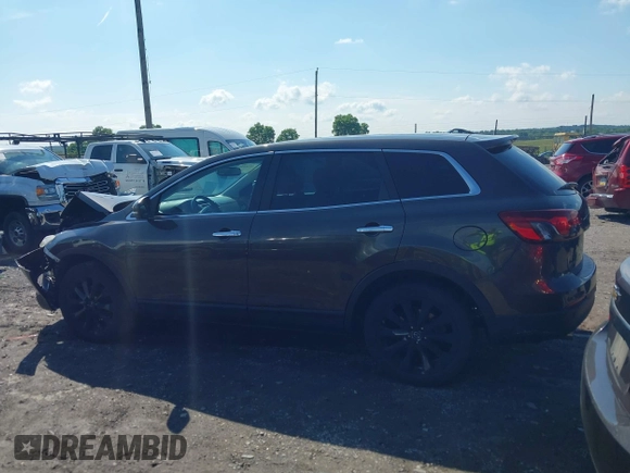 2015 Mazda CX-9 Grand Touring z VIN JM3TB3DV8F0465155, wystawiony jako IAAI lot #42366636 z przebiegiem 125 407 mil mil oraz . Historia ofert i sprzedaży dostępna na DreamBid. Obrazek 14.