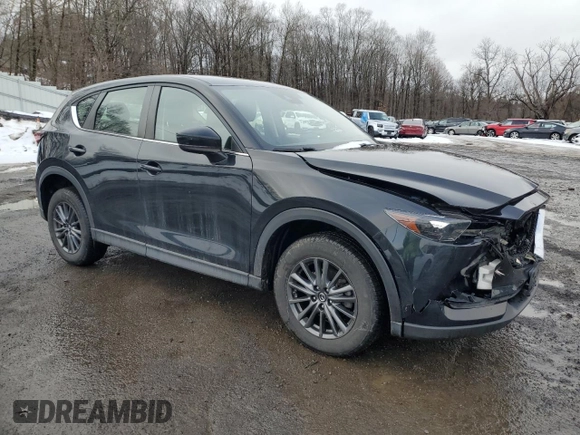 2019 Mazda CX-5 Sport with VIN JM3KFBBM7K0633737, listed as a Copart auction lot 45170645 with 76,023 mi miles and Salvage Title. Bid and sale history available at DreamBid. Image 4.