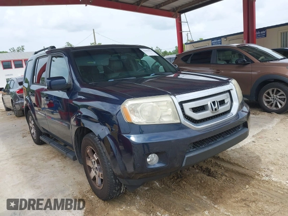 2011 Honda Pilot Touring z VIN 5FNYF3H94BB032105, wystawiony jako IAAI lot #42435522 z przebiegiem 247 899 mil mil oraz . Historia ofert i sprzedaży dostępna na DreamBid. Obrazek 1.