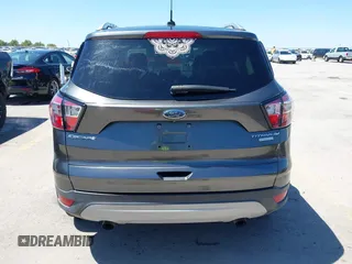 2017 Ford Escape Titanium with VIN 1FMCU0J97HUE07747, listed as a IAAI auction lot 41977788 with 104,560 mi miles. Bid and sale history available at carsss.com. Image 16.