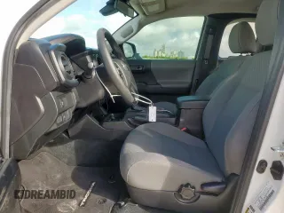 2023 Toyota Tacoma SR with VIN 3TYRX5GN3PT071058, listed as a Copart auction lot 62733165 with 28,441 mi miles and Salvage title. Bid and sale history available at DreamBid. Image 7.