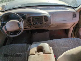1999 Ford F-150 XL with VIN 1FTRX18L2XKA01348, listed as a Copart auction lot 50087595 with 202,021 mi miles and Salvage Title. Bid and sale history available at carsss.com. Image 8.