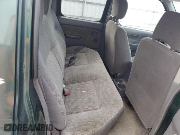 2000 Nissan Frontier XE z VIN 1N6ED27Y0YC324008, wystawiony jako Copart lot #46883815 z przebiegiem 193 512 mil mil oraz Szkoda całkowita • Salvage title. Historia ofert i sprzedaży dostępna na DreamBid. Obrazek 10.