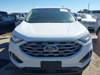 2019 Ford Edge SEL z VIN 2FMPK3J97KBC73053, wystawiony jako IAAI lot #41434650 z przebiegiem 136 425 mil mil oraz . Historia ofert i sprzedaży dostępna na DreamBid. Obrazek 13.