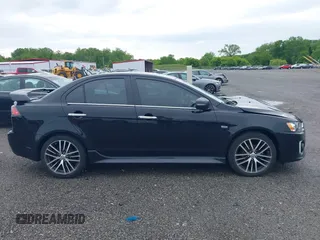 2017 Mitsubishi Lancer ES z VIN JA32V2FW6HU001870, wystawiony jako IAAI lot #42333550 z przebiegiem 75 938 mil mil oraz . Historia ofert i sprzedaży dostępna na DreamBid. Obrazek 13.