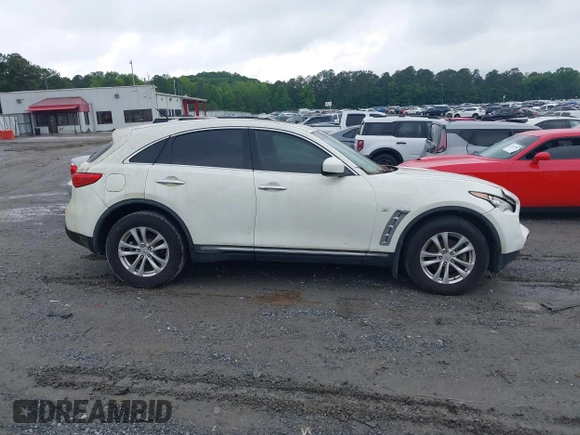 2014 Infiniti QX70 с VIN JN8CS1MU7EM451246, выставлен на аукционе IAAI как лот 42221306 с пробегом 190 252 миль миль и . История ставок и продаж доступна на DreamBid. Изображение 13.