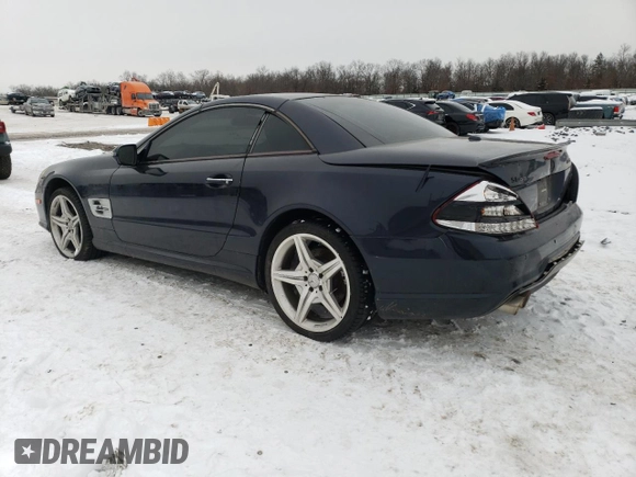 2009 Mercedes-Benz SL 550 with VIN WDBSK71F09F153162, listed as a Copart auction lot 88884365 with 155,973 mi miles and Salvage title. Bid and sale history available at DreamBid. Image 2.