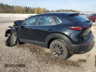2020 Mazda CX-30 with VIN 3MVDMBBL7LM107409, listed as a Copart auction lot 77851014 with 102,182 mi miles and Non Repairable. Bid and sale history available at DreamBid. Image 2.
