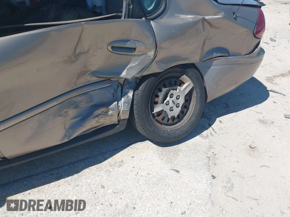 2006 Ford Taurus SE with VIN 1FAFP53U96A223924, listed as a IAAI auction lot 41828443 with 114,653 mi miles. Bid and sale history available at carsss.com. Image 12.