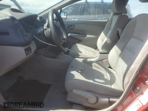 2010 Honda Insight EX with VIN JHMZE2H77AS025567, listed as a Copart auction lot 58499135 with 152,501 mi miles and Salvage title. Bid and sale history available at DreamBid. Image 7.