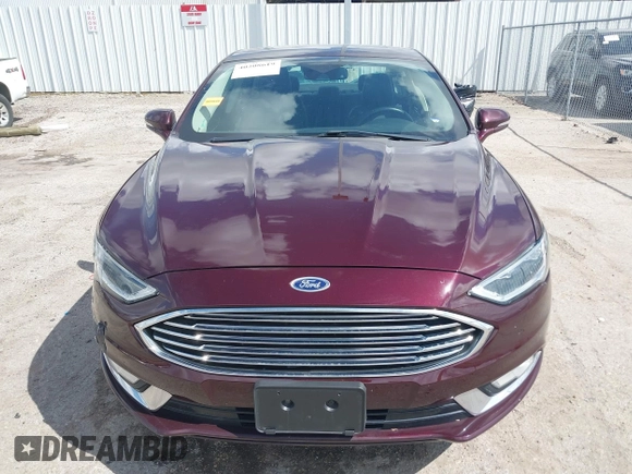 2017 Ford Fusion Titanium with VIN 3FA6P0K97HR214485, listed as a IAAI auction lot 40208619 with 39,265 mi miles and . Bid and sale history available at DreamBid. Image 12.