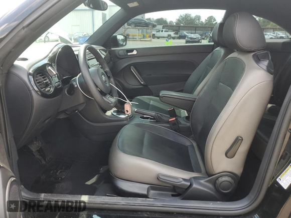 2015 Volkswagen Beetle Fleet Edition with VIN 3VWF17ATXFM645590, listed as a Copart auction lot 58234745 with 128,469 mi miles and Salvage title. Bid and sale history available at DreamBid. Image 7.