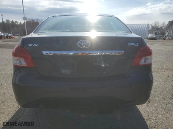 2008 Toyota Yaris with VIN JTDBT923X81230906, listed as a Copart auction lot 51189245 with 124,438 mi miles and Salvage Title. Bid and sale history available at carsss.com. Image 6.