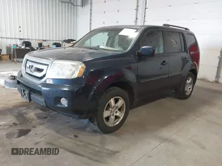 2011 Honda Pilot EX-L with VIN 5FNYF4H54BB043205, listed as a IAAI auction lot 41879077 with 240,108 mi miles. Bid and sale history available at carsss.com. Image 2.