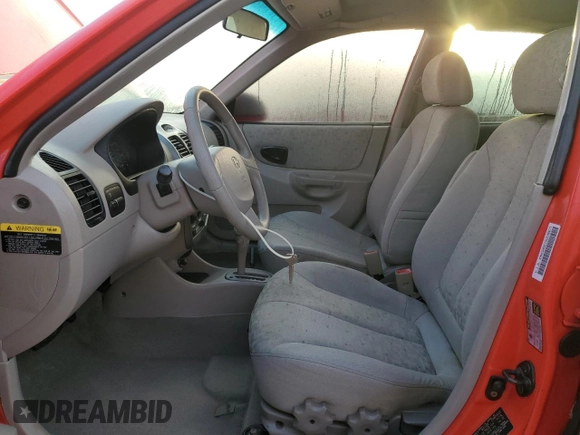 2005 Hyundai Accent GLS with VIN KMHCG45C15U596671, listed as a Copart auction lot 74834004 with 0 mi miles and Salvage Title. Bid and sale history available at carsss.com. Image 7.