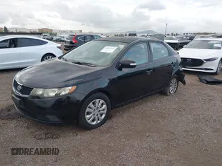 2010 Kia Forte EX with VIN KNAFU4A28A5050734, listed as a IAAI auction lot 42063165 with 179,284 mi miles. Bid and sale history available at carsss.com. Image 17.