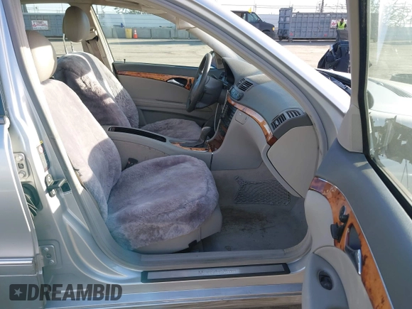 2005 Mercedes-Benz E-Class 3.2L with VIN WDBUF65JX5A718711, listed as a IAAI auction lot 41625603 with 145,024 mi miles. Bid and sale history available at carsss.com. Image 5.