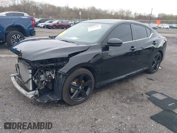 2022 Nissan Sentra SR z VIN 3N1AB8DVXNY307372, wystawiony jako IAAI lot #41958405 z przebiegiem 30 373 mil mil oraz . Historia ofert i sprzedaży dostępna na DreamBid. Obrazek 16.