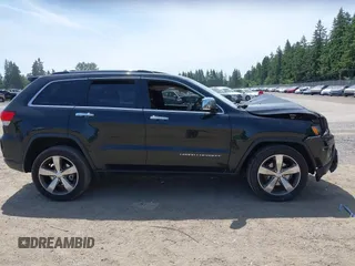 2014 Jeep Grand Cherokee Limited z VIN 1C4RJFBG1EC547169, wystawiony jako IAAI lot #42453027 z przebiegiem 136 125 mil mil oraz . Historia ofert i sprzedaży dostępna na DreamBid. Obrazek 13.
