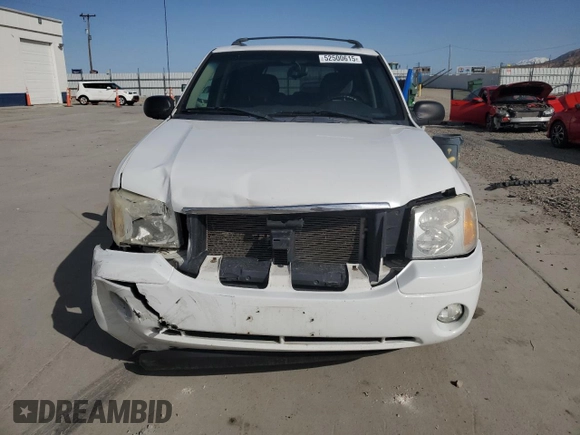 2006 GMC Envoy SLE z VIN 1GKDT13S462156541, wystawiony jako Copart lot #52500615 z przebiegiem 140 558 mil mil oraz Szkody całkowita. Historia ofert i sprzedaży dostępna na DreamBid. Obrazek 5.