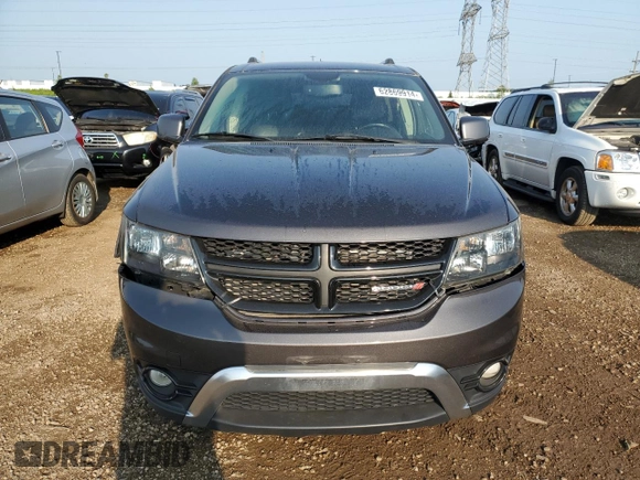 2016 Dodge Journey Crossroad z VIN 3C4PDCGB4GT171990, wystawiony jako Copart lot #62869914 z przebiegiem 130 803 mil mil oraz Szkoda całkowita • Salvage title. Historia ofert i sprzedaży dostępna na DreamBid. Obrazek 5.