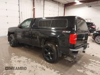 2015 Chevrolet Silverado 1500 LT with VIN 1GCNKREC7FZ176054, listed as a IAAI auction lot 41940955 with 197,857 mi miles and . Bid and sale history available at DreamBid. Image 3.