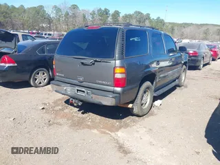 2001 Chevrolet Tahoe LT with VIN 1GNEK13T11J144185, listed as a IAAI auction lot 41647366 with 286,225 mi miles. Bid and sale history available at carsss.com. Image 4.