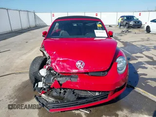 2013 Volkswagen Beetle 2.5L with VIN 3VW5P7AT1DM833048, listed as a IAAI auction lot 41769453 with Not Provided miles and . Bid and sale history available at DreamBid. Image 12.