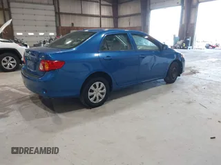 2009 Toyota Corolla with VIN JTDBL40E699037792, listed as a IAAI auction lot 41838231 with 199,690 mi miles. Bid and sale history available at carsss.com. Image 4.
