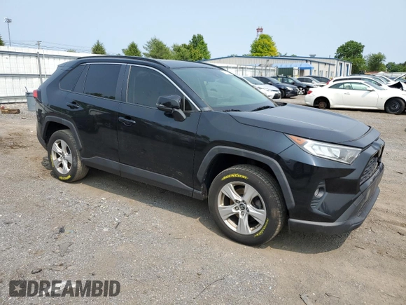 2019 Toyota RAV4 XLE with VIN JTMP1RFV8KJ001784, listed as a Copart auction lot 59109235 with 98,858 mi miles and Salvage title. Bid and sale history available at DreamBid. Image 4.